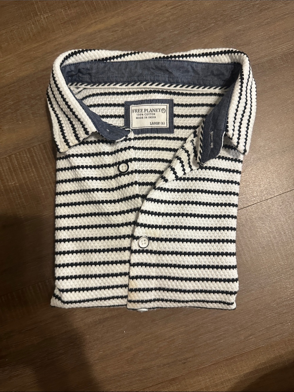 Boys Free Planet White and Navy Striped polo.